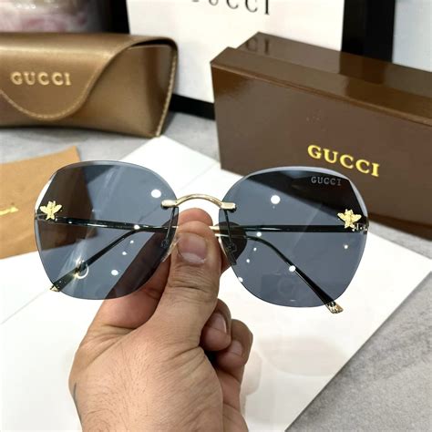 gucci sunglasses with bee on front|Gucci reflective sunglasses.